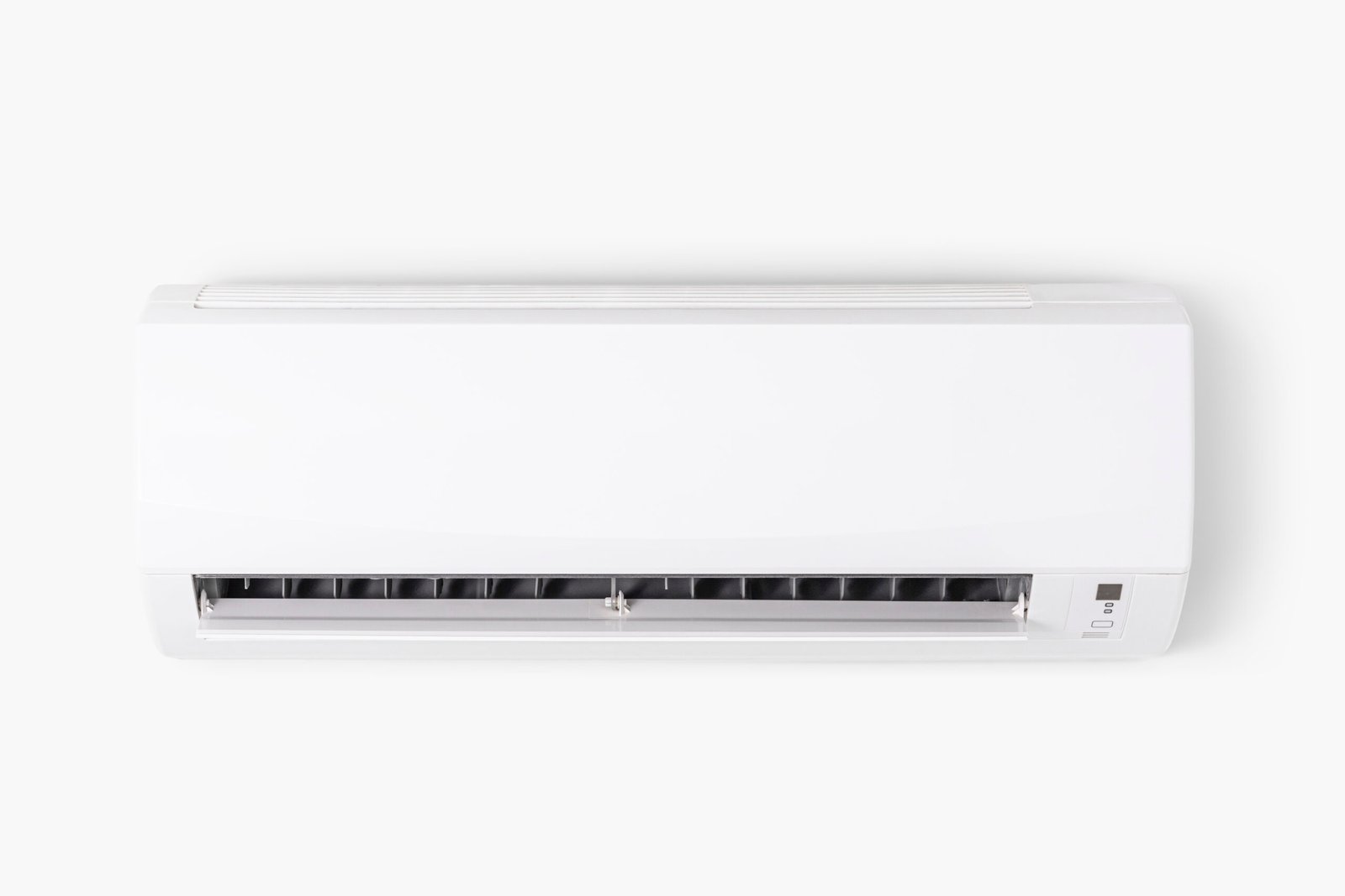 Air conditioner mounted on a white wall